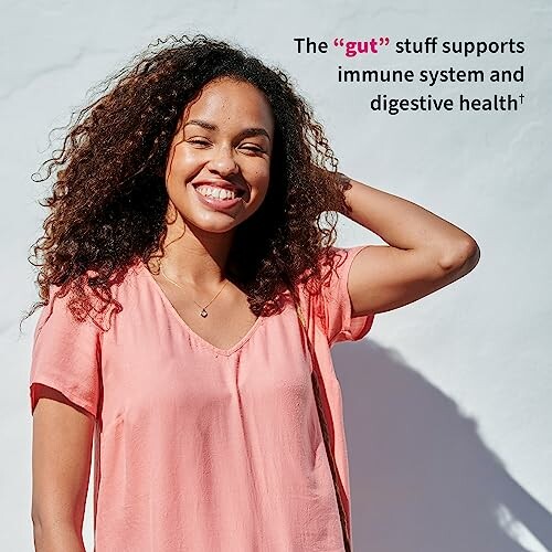 Smiling woman in pink shirt with gut health text